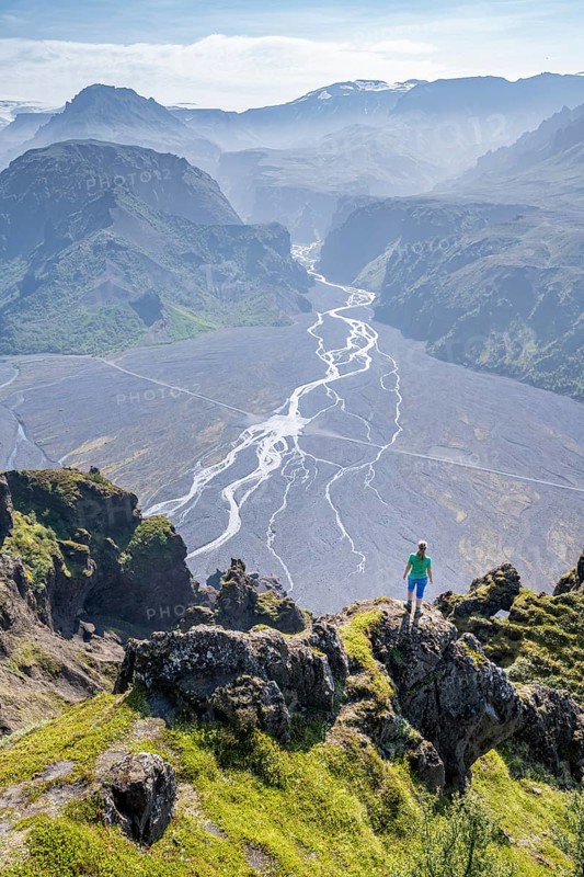 Hiker looking over landscape