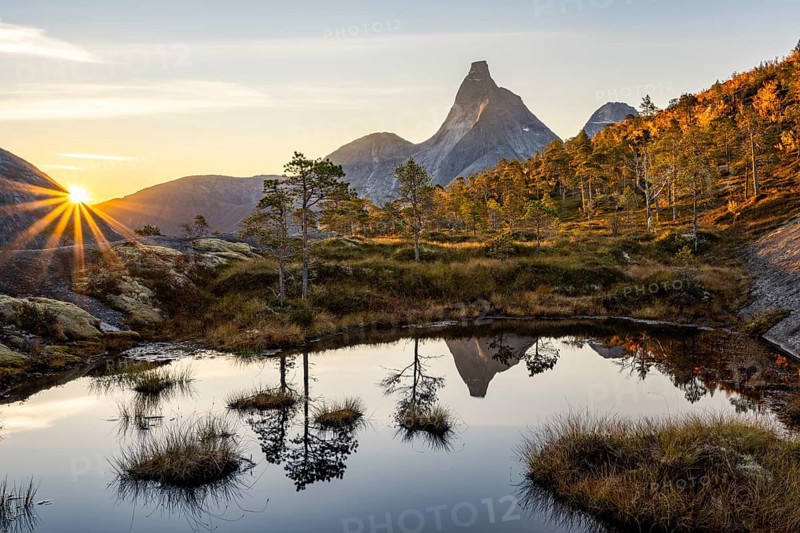 Stetind reflected in small pond