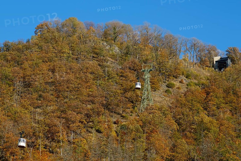 Cable car up the large castle hill in autumn