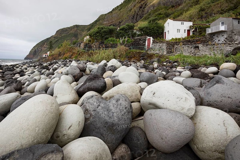 Coast with large round stones in Rocha da Relva