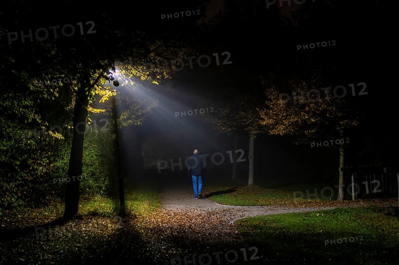 A man walks through a lonely park in Markt Swabia