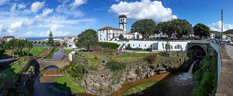 City park with town hall and bell tower