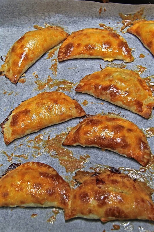 Baking tray with baked empanadas