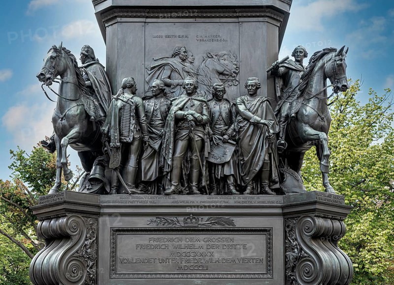 Bronze figures at the base of the monument to Frederick the Great Unter den Linden