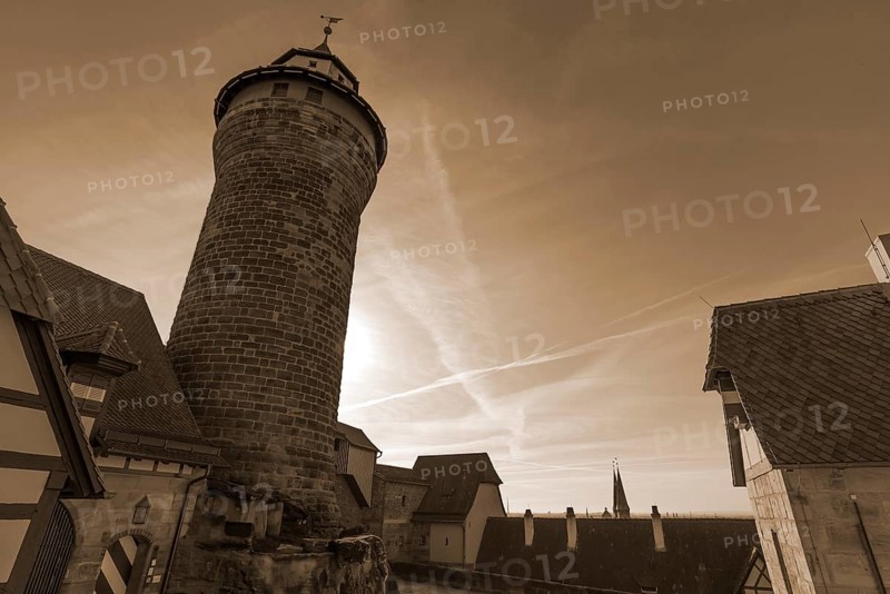 Sinwell Tower on the Kaiserburg in the backlight