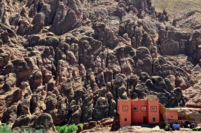 Red House in front of rock formations in the Dade Valley