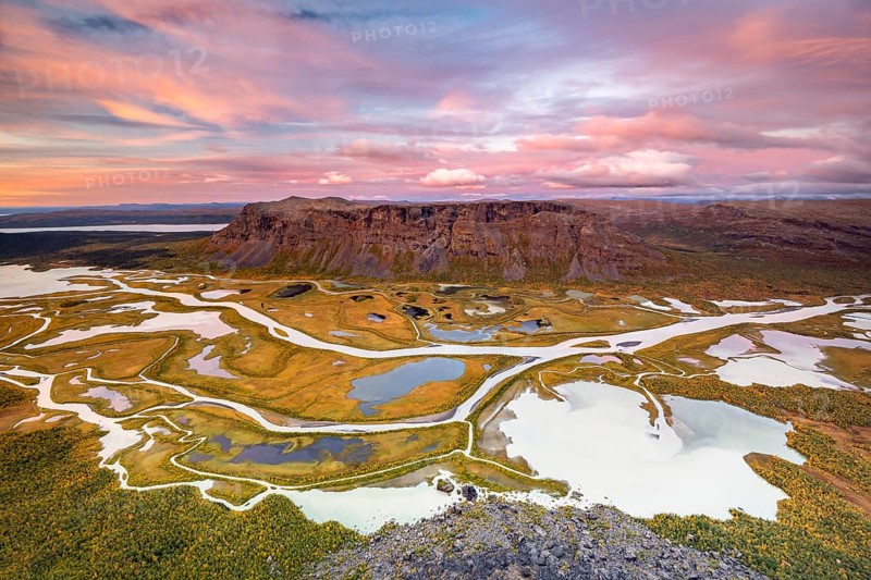 View from Skierffe mountain over the autumnal Rapadalen river delta