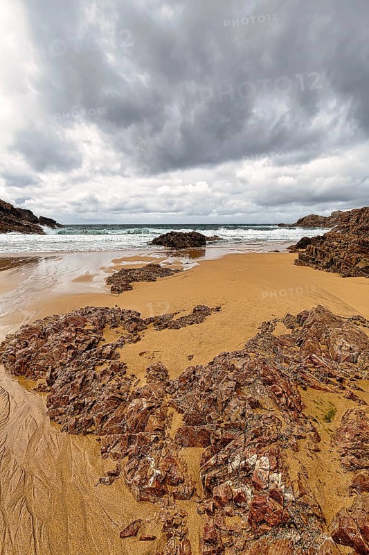 Rocks on the sandy beach