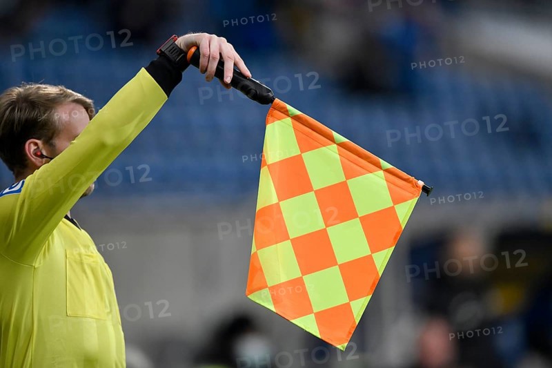 Linesman shows flag
