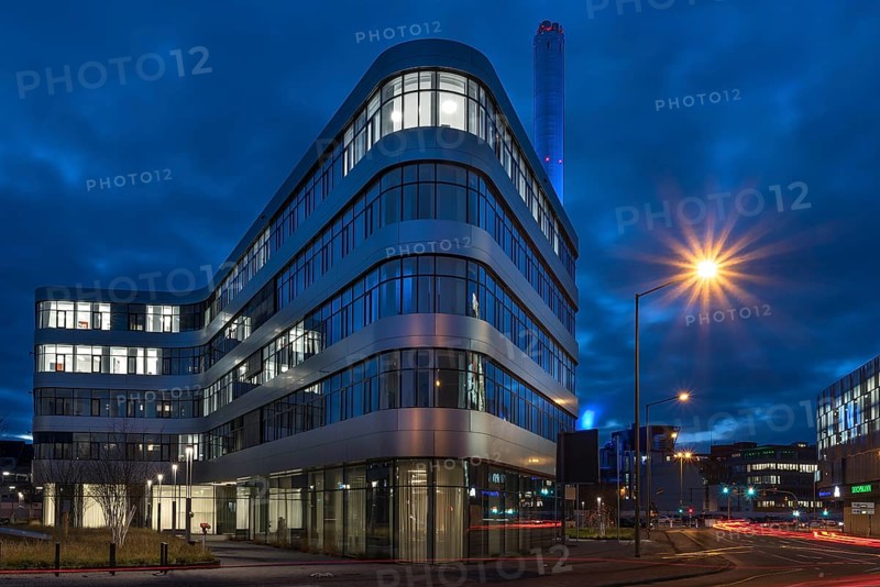 The district administration office and the chimney of the combined heat and power plant