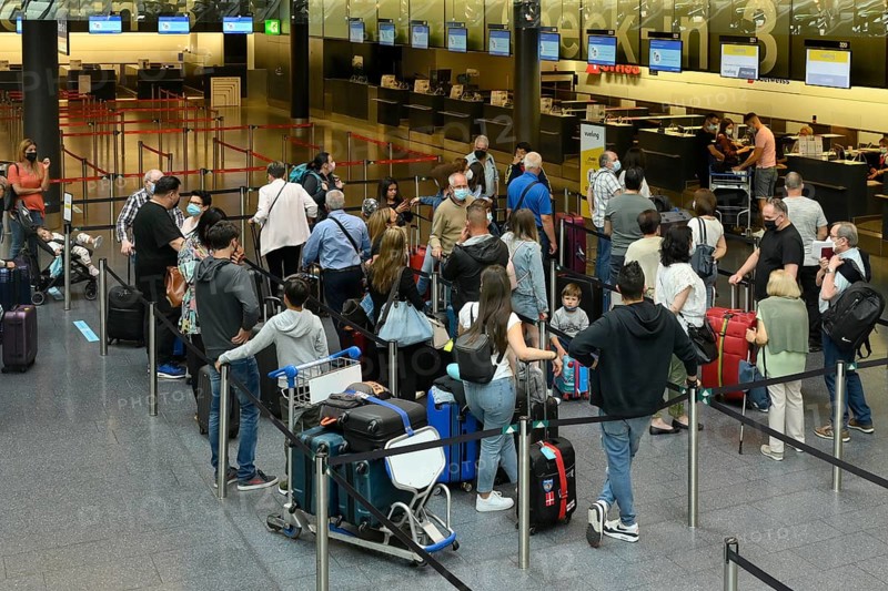 Passengers checking in at Zurich Airport