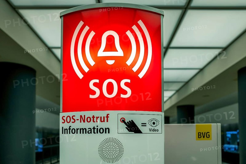 Red emergency call box at a Berlin underground station
