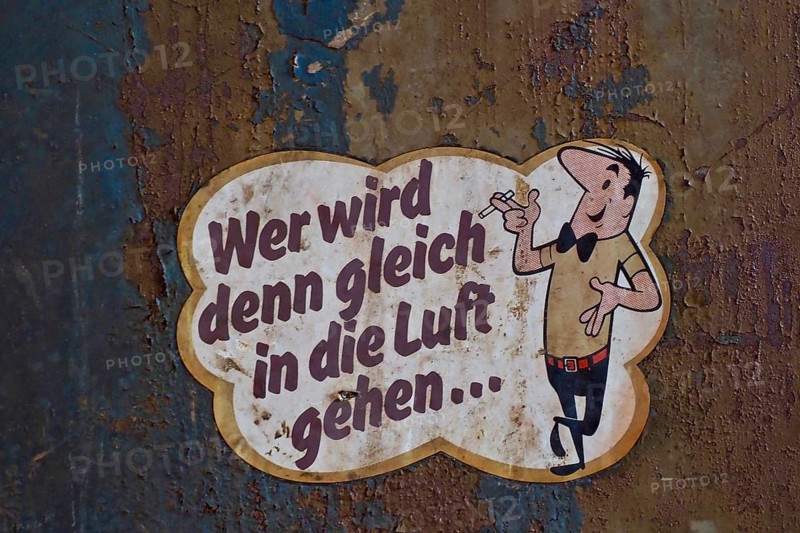 Cigarette advertisement with HB man on train carriage