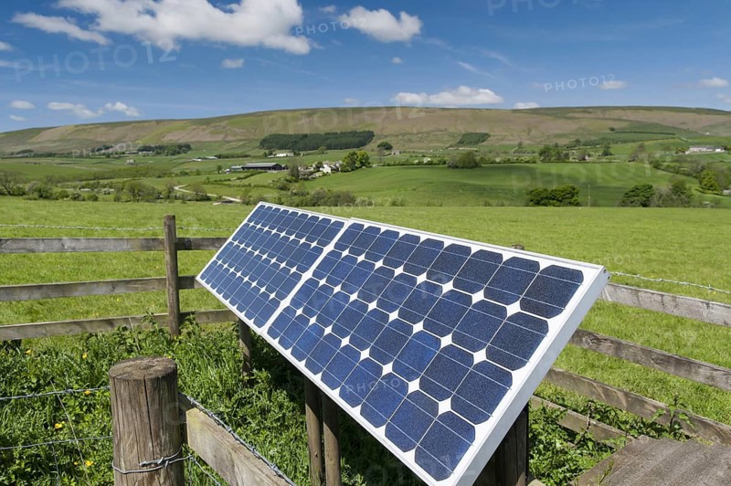 Solar panels on farm used to operate electric gate along farm track. Lancashire