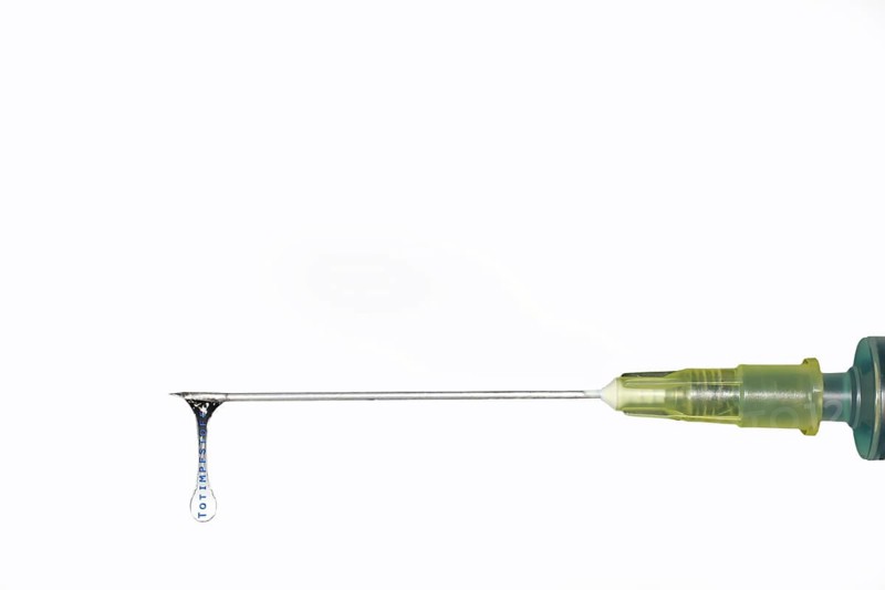 Hypodermic needle filled with inactivated vaccine