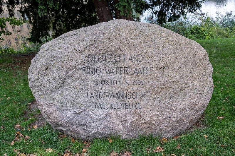 Memorial stone of the Landsmannschaft Mecklenburg for the reunification of Germany on 3 October 1990 on the shore of the Schwerin Inner Lake near the Schwerin Castle