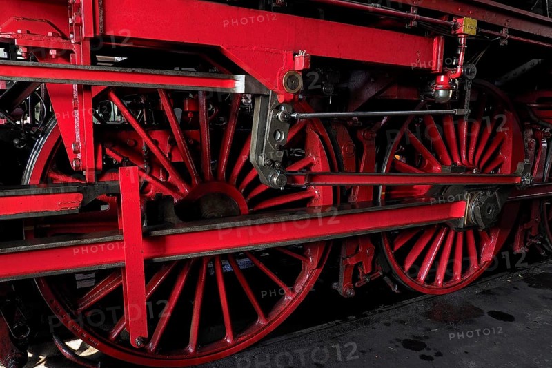 Red rail wheels of a locomotive