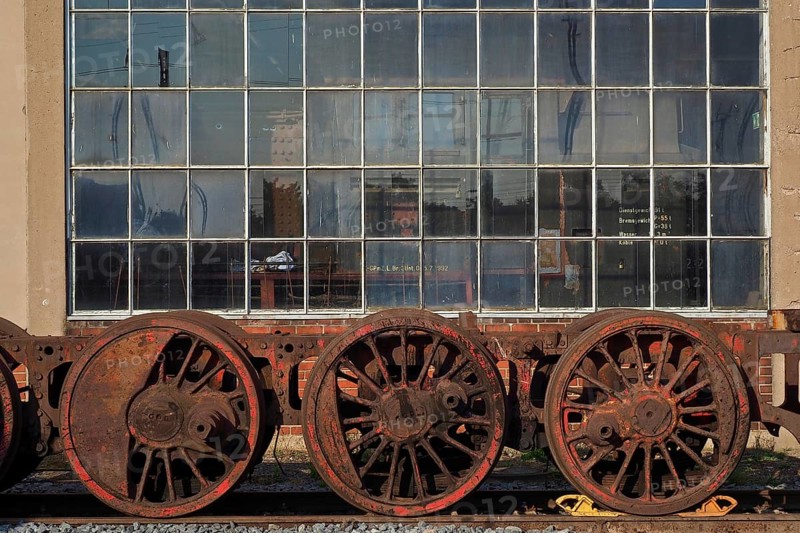 Rail wheels in front of workshop