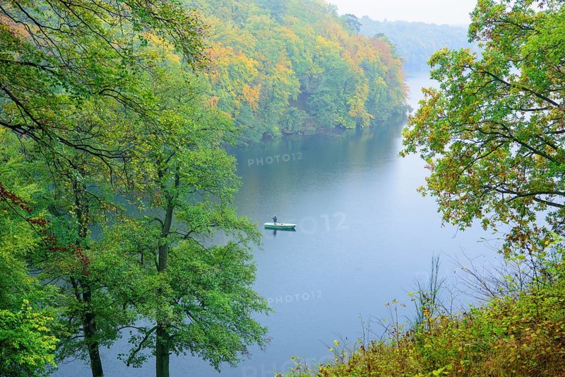 Narrow Luzin in autumn with angler