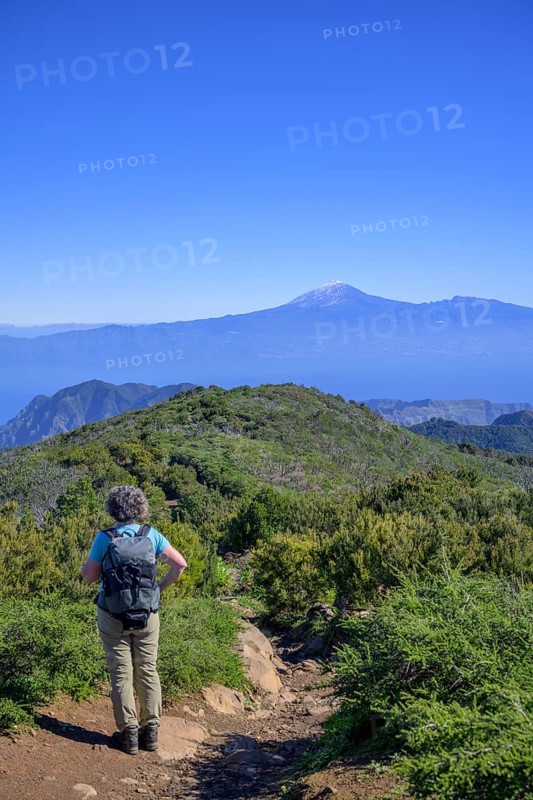 Hiking to the summit of Garajonay with Teide in the background