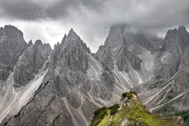 Hiker standing on a ridge