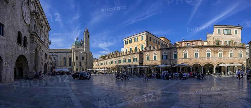 Piazza del Popolo and the Church of San Francesco on the right Loggia dei Mercanti