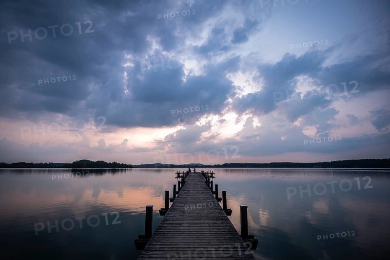 Footbridge into the Woerthsee shortly in front of sunrise