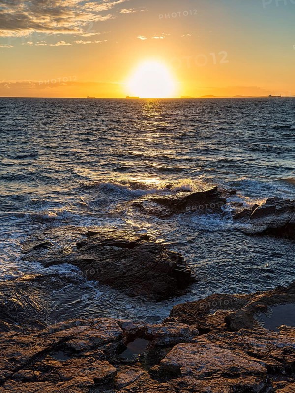 Sunset by the sea