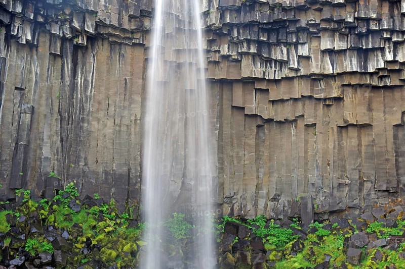 Columnar basalt with waterfall