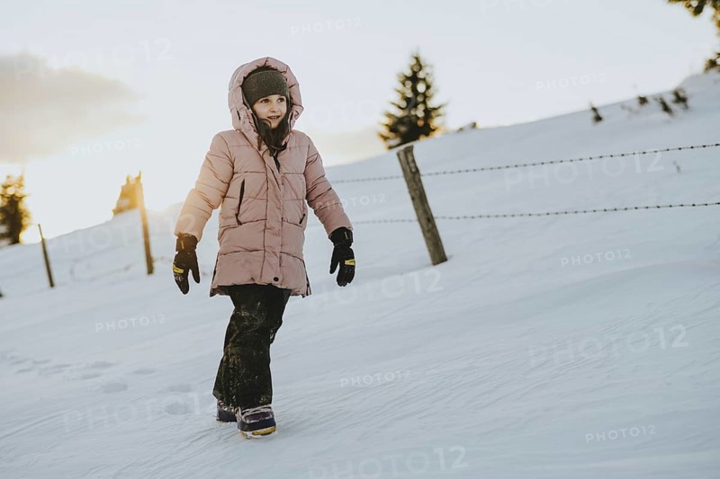 Girl trudging in the snow