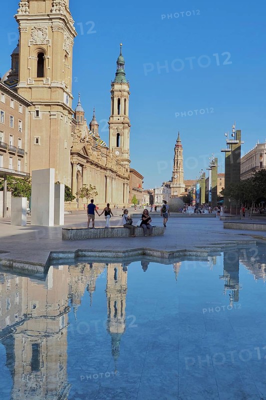 Reflection of the Baroque Basilica del Pilar in the Hispanidad Fountain