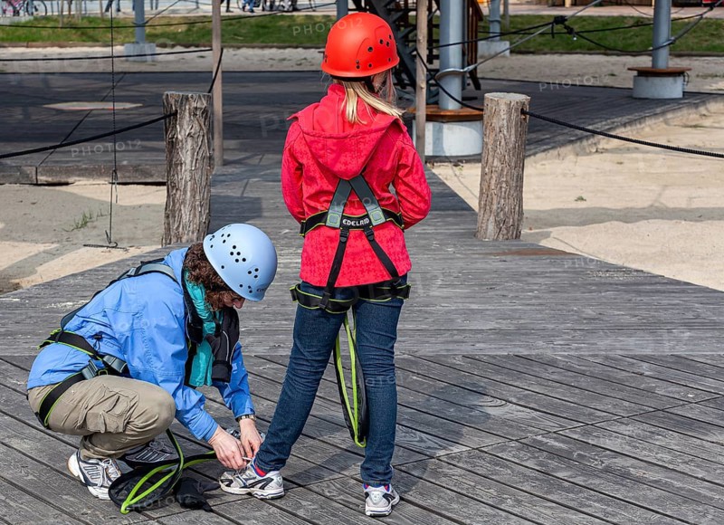 A woman and her niece prepare for their outdoor climbing trip