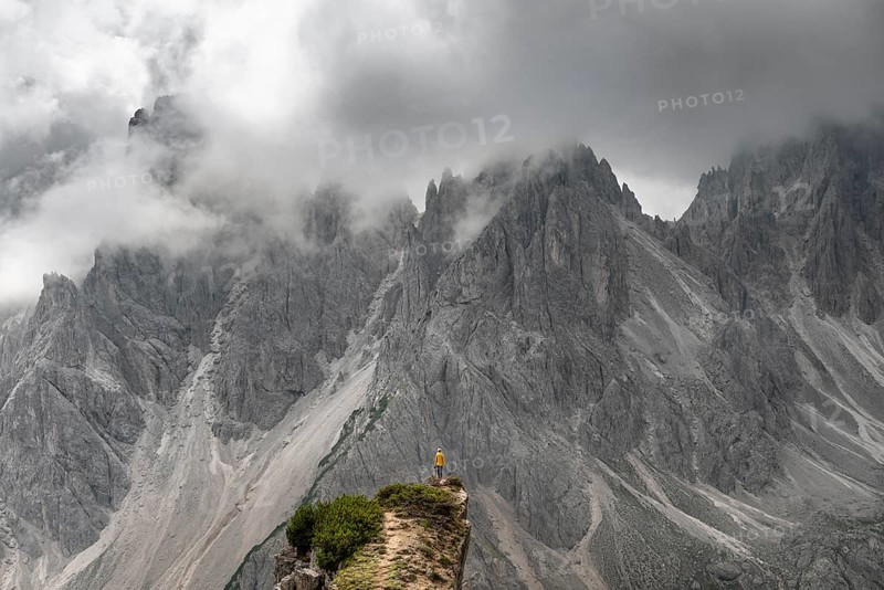 Hiker standing on a ridge