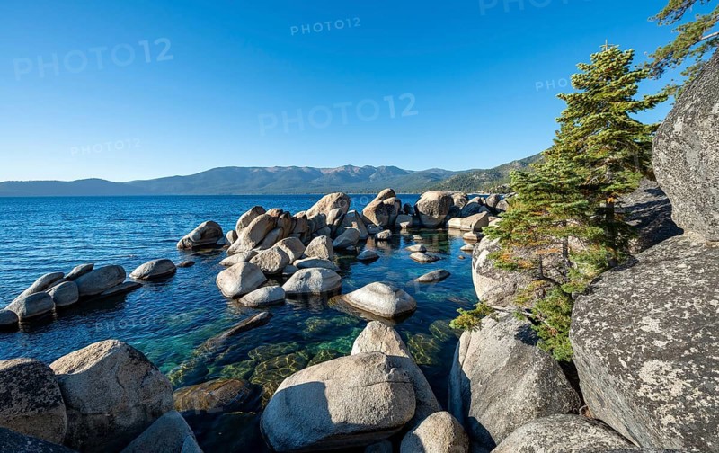 Lake Tahoe shore with round stones in the water