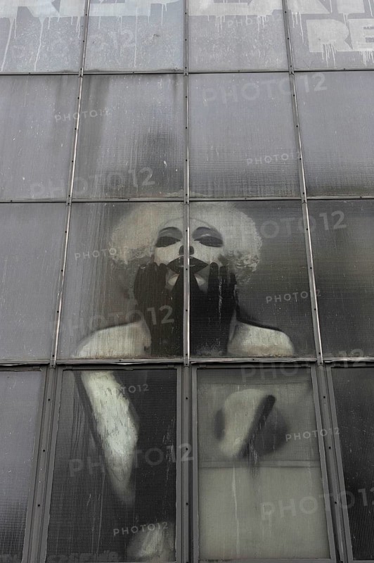 Industrial window with Marilyn Monroe behind the panes