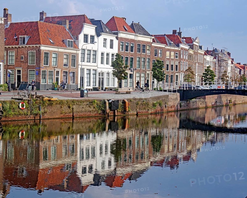 Houses reflected in the canal