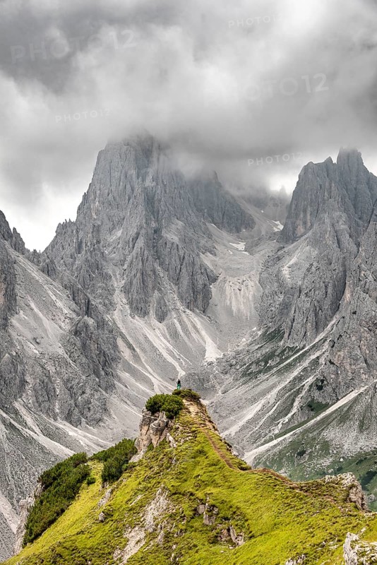 Hiker standing on a ridge