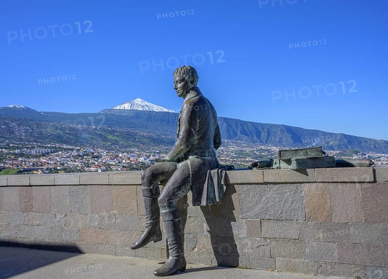 Statue of Humboldt behind the snow-capped Teide