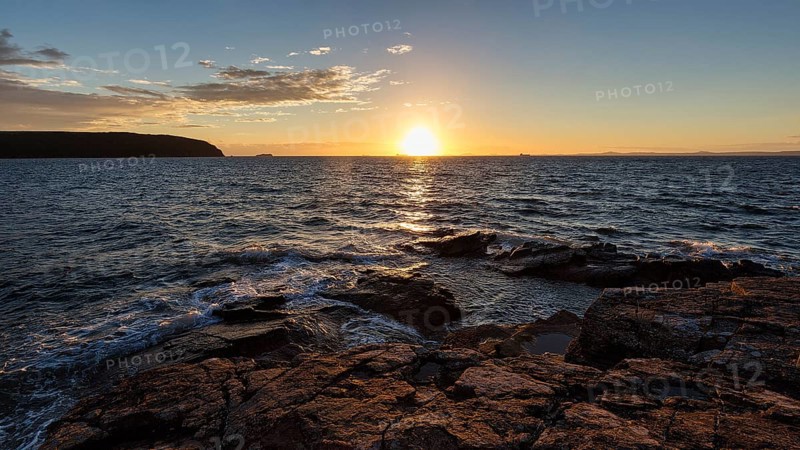 Sunset by the sea
