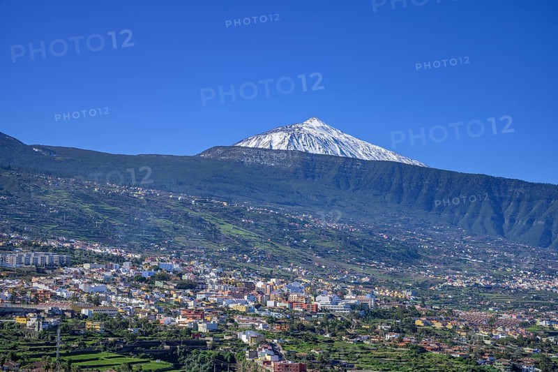 View over the town to the snow-capped Teide