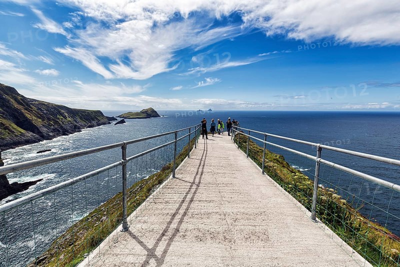 Hiking trail with railing on cliff