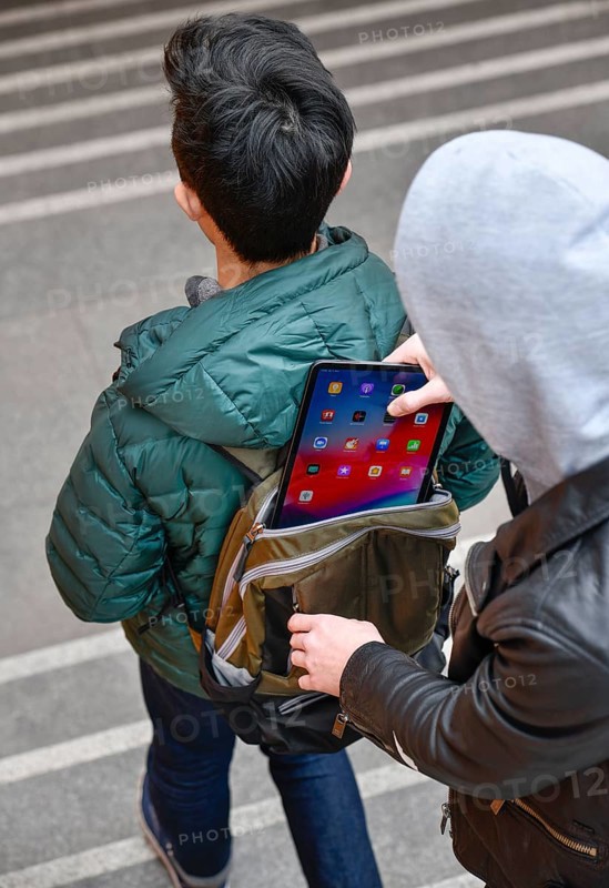 Theft of a tablet from a backpack