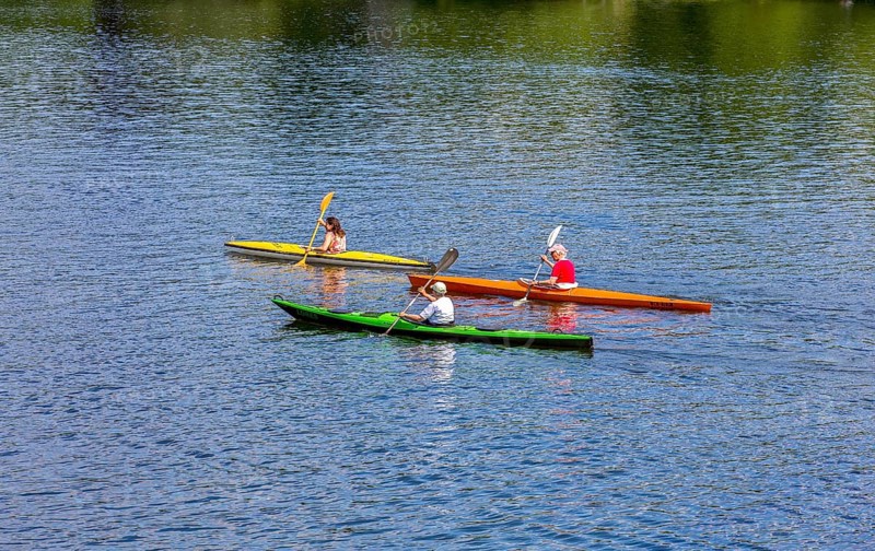 Recreational sportsmen with their kayak on the Havel