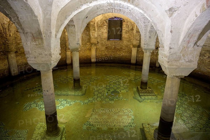 Flooded floor mosaic in the crypt of the Basilica di San Pietro Maggiore in San Francesco