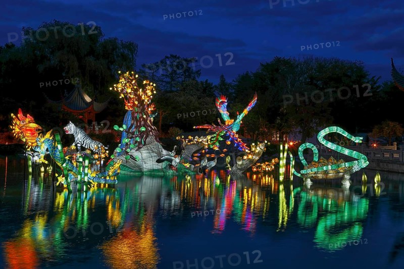 Illuminated figures at the Chinese Garden
