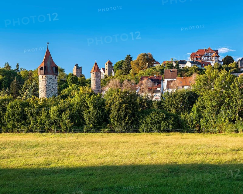 View of the old town with fortified towers and half-timbered houses