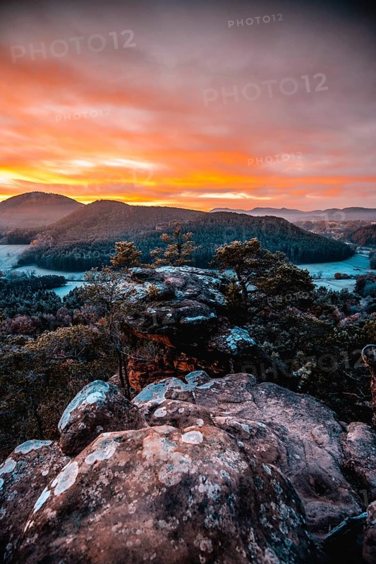 View from the sandstone rock Wachtfelsen to the sunrise