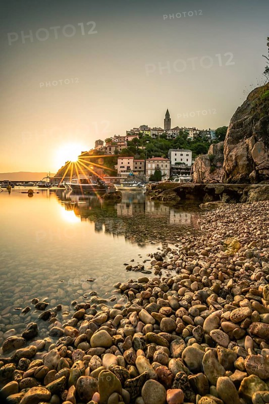 Historical village by the sea. Bay with harbour in the morning