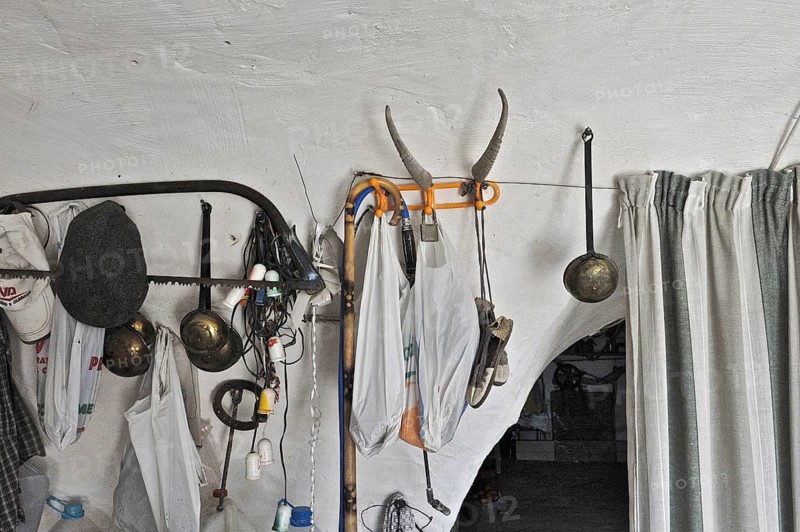 Decoration of objects on wall of cave house