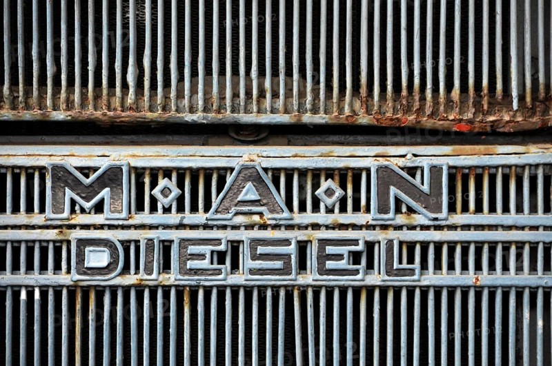 MAN Diesel emblem on the radiator grille of a MAN truck
